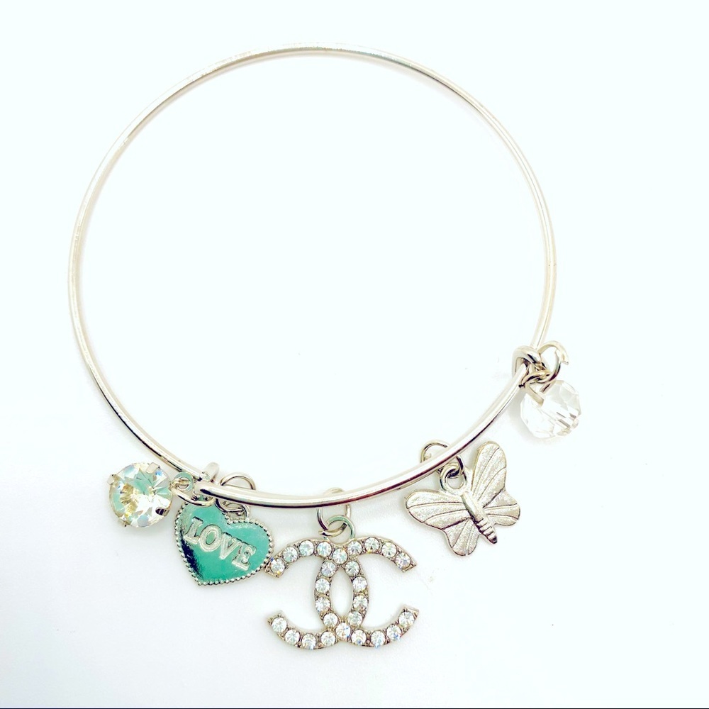 Bracelet Crystal Love butterfly on Silver tone wire.